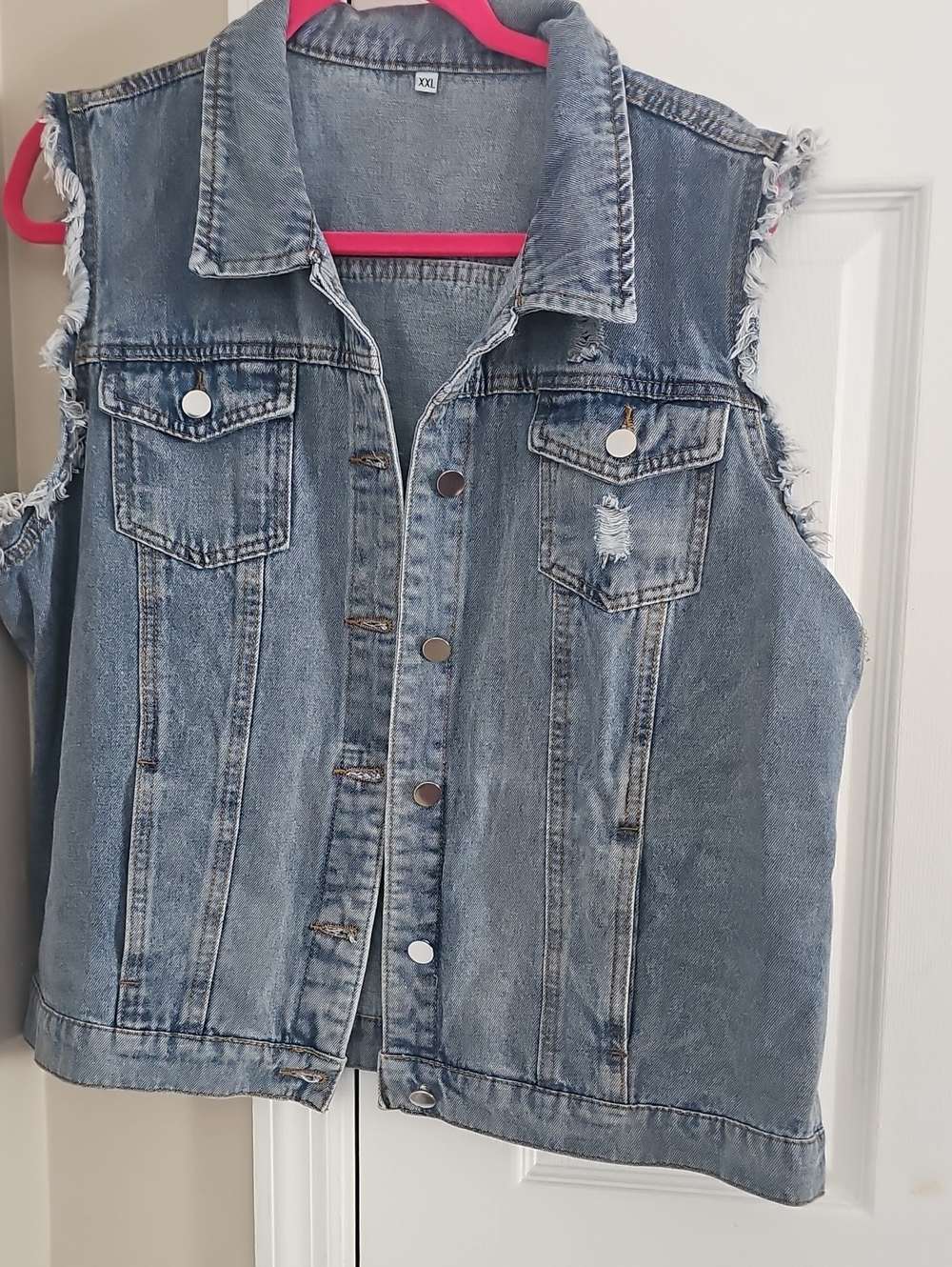 Sleeveless Distressed Denim Vest in Light Blue